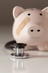 Image showing Piggy Bank and Stethoscope with Selective Focus