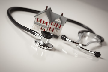 Image showing Stethoscope with Small Model Home