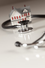 Image showing Stethoscope with Small Model Home