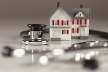 Image showing Stethoscope with Small Model Home