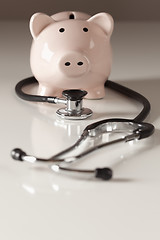 Image showing Piggy Bank and Stethoscope with Selective Focus