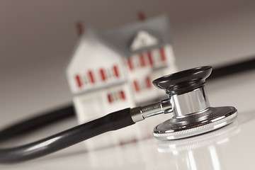 Image showing Stethoscope with Small Model Home