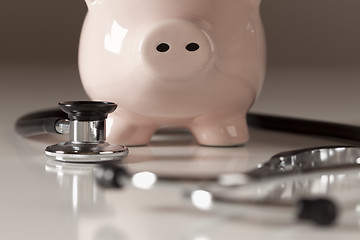 Image showing Piggy Bank and Stethoscope with Selective Focus