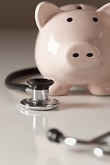 Image showing Piggy Bank and Stethoscope with Selective Focus