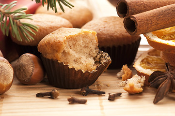 Image showing Freshly baked muffins with difrens kind of spieces - christmas d