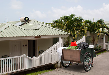 Image showing Cleaning cart outside villa