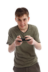 Image showing Happy teen boy playing a game