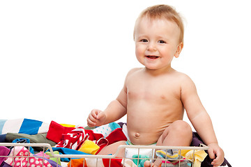 Image showing Laughing baby with clothes