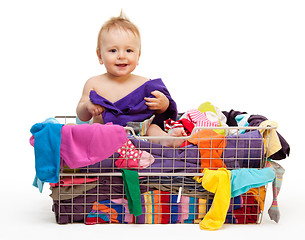 Image showing Happy baby with clothes