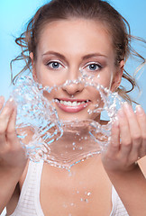 Image showing Happy morning face washing