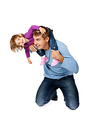 Image showing Happy father holding daughter on his shoulders