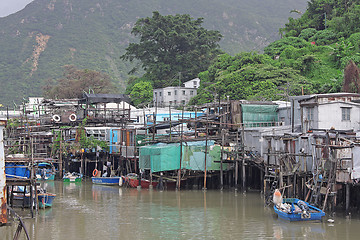 Image showing famous wood house on water