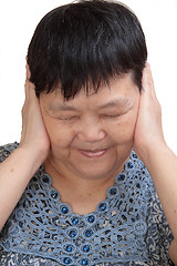 Image showing Woman covering her ears - Hear no evil