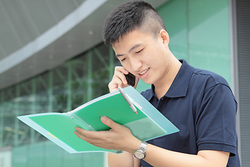 Image showing Portrait of businessman calling by phone 