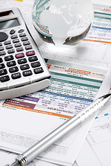 Image showing financial charts and graphs on the table 