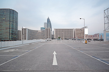 Image showing large numbered space parking lot 