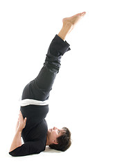 Image showing woman yoga position toe raise Half Shoulderstand -- Ardha Sarvan