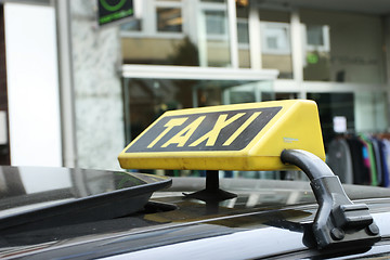 Image showing TAXI sign