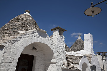 Image showing Trulli and lamp