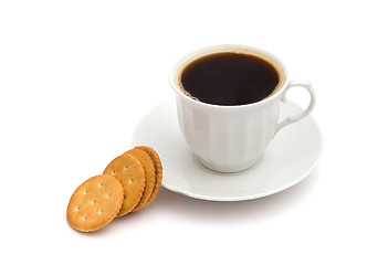 Image showing White cup of coffee with crackers