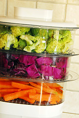 Image showing Colorful vegetables in steamer