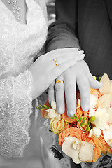 Image showing Wedding: hands, rings and bouquet