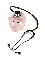 Image showing Piggy Bank and Stethoscope Isolated