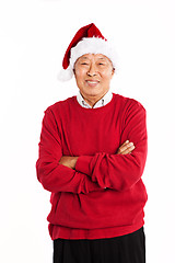 Image showing Senior Asian celebrating Christmas