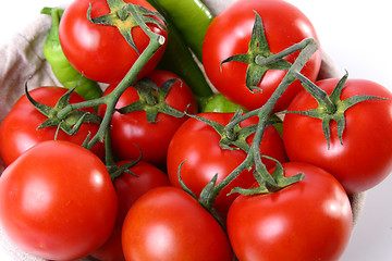 Image showing Close-up of red tomatoes and green peperoni