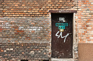 Image showing Part of an industrial building with big door