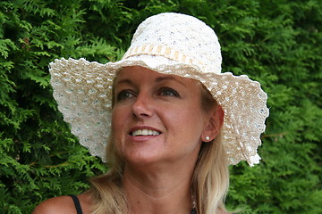Image showing Woman in white hat