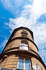 Image showing Angle shot of a tall building with blue sky