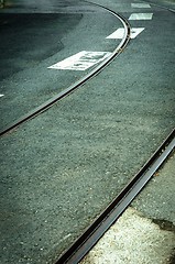Image showing A curve in the road with railway