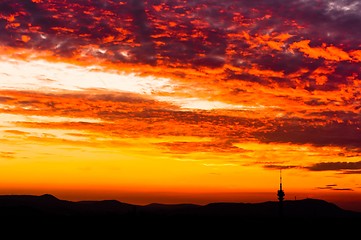 Image showing Silhouettes of mountains and sky with cliuds