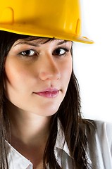 Image showing Engineer woman in yellow helmet against white isolated backgroun