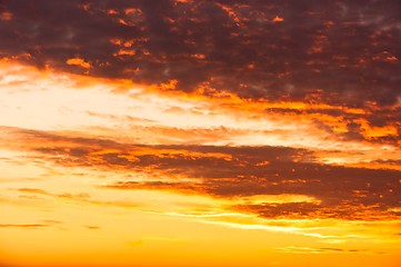 Image showing Orange sunset with clouds