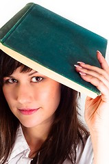 Image showing Young girl and her book against white background