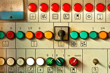 Image showing Many big buttons on an industrial board