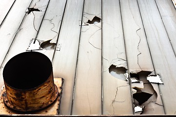 Image showing Broken glass and ventilation fan on abandoned industrial buildin