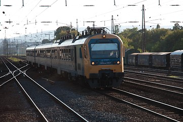 Image showing Angle shot of a train coming very fast