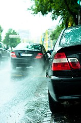 Image showing Parked car in rain with blurry background