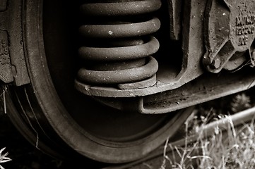 Image showing Wheels of a train with rust in black and white