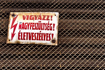 Image showing High voltage sign as an industrial background