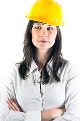Image showing Portrait of a young engineer woman in yellow helmet