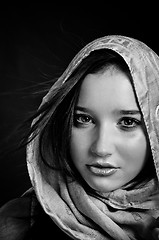 Image showing Closeup of a beautiful girl in scarf in black and white