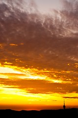 Image showing Orange sunset with clouds