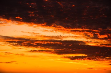 Image showing Orange sunset with clouds 
