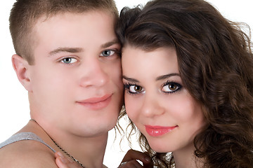 Image showing Portrait of the young beautiful couple. Isolated on white