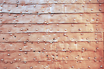 Image showing Rusty ancient metallic gate surface