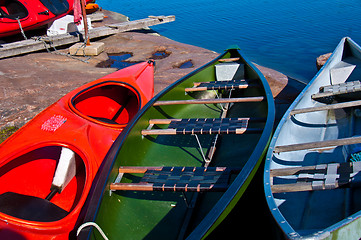 Image showing Colorful canoes